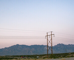 power line and mountains in the new mexican morning