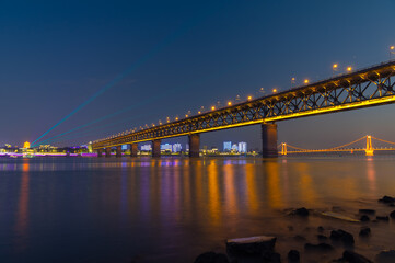 Fototapeta na wymiar Wuhan Yangtze River and city night and light show scenery