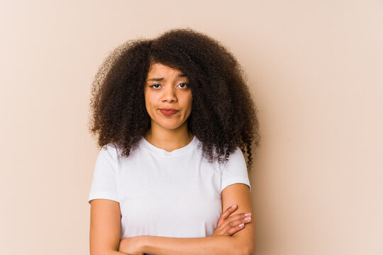 Young african american woman unhappy looking in camera with sarcastic expression.