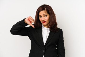 Middle age latin business woman isolated showing a dislike gesture, thumbs down. Disagreement concept.