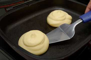 Fototapeta na wymiar frying pan with souffle pancake