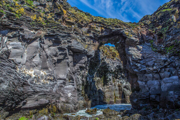 The volcanic black basalt landscape at the coast of Hellnar, a small town in Snaefellsnes, Iceland.