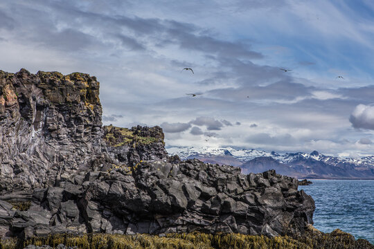 The volcanic black basalt landscape at the coast of Hellnar, a small town in Snaefellsnes, Iceland.