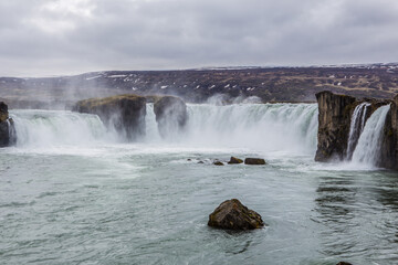 Godafoss, also known as gods waterfall, a big waterfall at the north part of Iceland, during summer time, cloudy day.