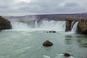 Godafoss, also known as gods waterfall, a big waterfall at the north part of Iceland, during summer time, cloudy day.