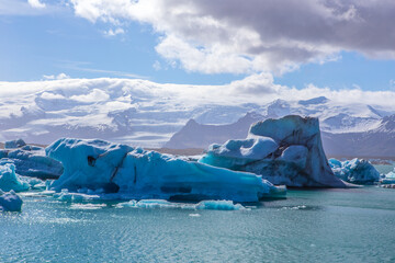 Jokulsarlon Lagoon, a blue glacier lagoon at the south coast of Iceland, on summer time, at a sunny...