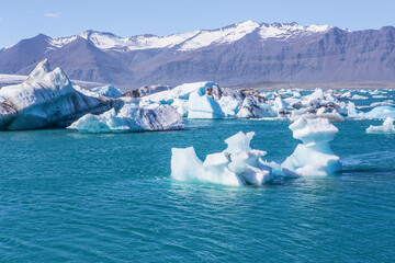Jokulsarlon Lagoon, a blue glacier lagoon at the south coast of Iceland, on summer time, at a sunny...