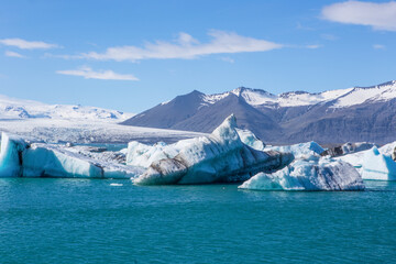 Jokulsarlon Lagoon, a blue glacier lagoon at the south coast of Iceland, on summer time, at a sunny...