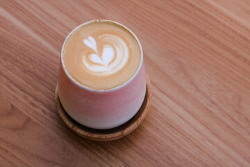 cup of coffe on wooden background