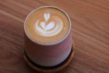 cup of coffe on wooden background