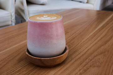 cup of coffe on wooden background