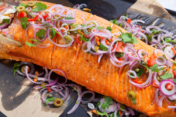 Spicy salmon freshly prepared Thai food. Healthy fusion and spicy menu in Thailand. 
