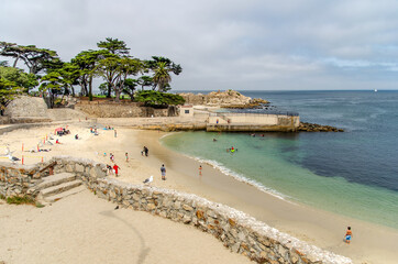 People relaxing on the beach in Monterey after quarantine. Life after the coronavirus pandemic.