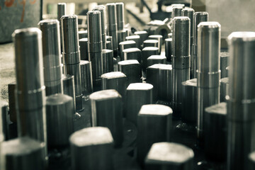 Metalworking of parts on CNC machines. Metal products manufactured at the factory, close-up.