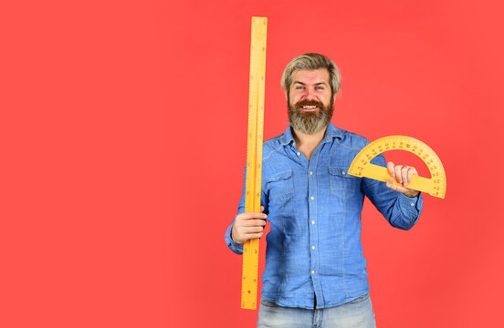 ready for engineering. tool for graphics. mature bearded man hold protractor ruler. study at home. education. school teacher use protractor. math and geometry subject. back to school. copy space