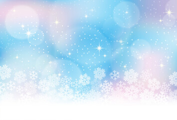 雪の結晶、冬のイメージの水色背景素材