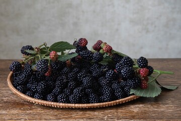 Wicker tray with fresh blackberries closeup