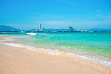 Fototapeta premium Hainan island, Sanya city. Scenic seascape. Wuzhizhou tropical Island for Relax and Water Activities. Sanya city Chinese Resort for summer vacation by the sea. Popular tourism destination in China. 