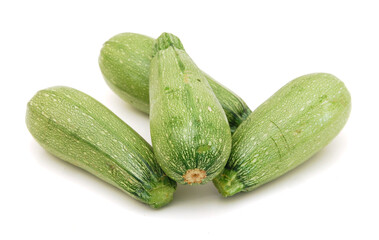 Stack fresh green zucchini isolated on white background 