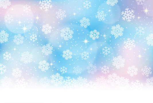 雪の結晶、冬のイメージの水色背景素材