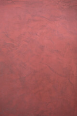 Red microcement texture background