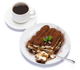 portion of Classic tiramisu dessert and cup of fresh espresso coffee isolated on white background with clipping path