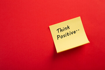 Motivational think positive word on note pads