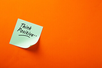 Motivational think positive word on note pads