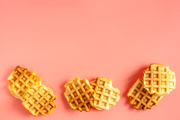 Traditional belgian waffles on pink background top view mockup