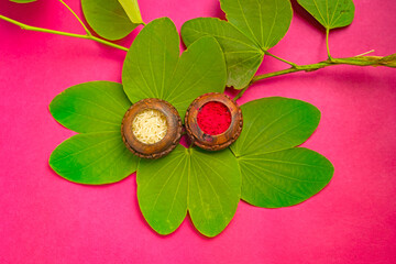 Indian Festival Dussehra , green leaf and rice