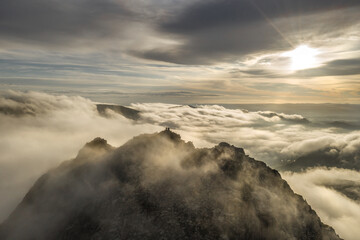 Tryfan mountain in Snowdonia aerial sunrise with cloud inversion