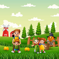 Obraz na płótnie Canvas Happy family in the pumpkin garden