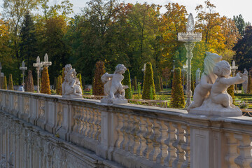 small statues along the stone railings with columns