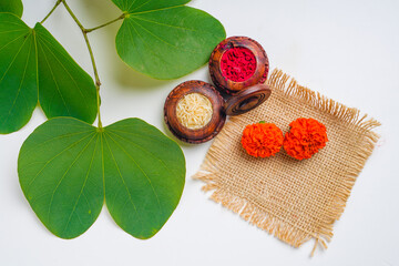 Indian festival dussehra, green apta leaf and rice