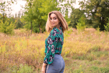 young woman in a field