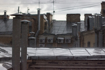 Old city roofs during heavy rain, Saint-Petersburg, Russia