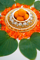 ,Indian festival dussehra , green leaf with rice and sweets