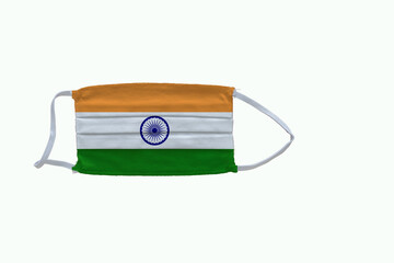 Indian flag design Covid-19 pandemic virus face mask on a white background with copy space