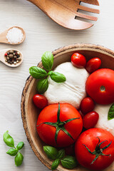 Fototapeta na wymiar Tomato, Mozzarela and Basil Salad
