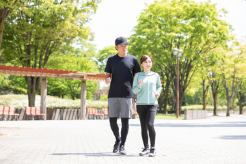 Fototapeta premium ランニング・ジョギング・ウォーキングする男女 