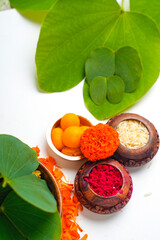 ,Indian festival dussehra , green leaf with rice and sweets