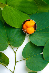 ,Indian festival dussehra , green leaf with rice and sweets