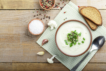 Vegetarian white soup cream of cauliflower. Vegetarian healthy food concept. Top view.