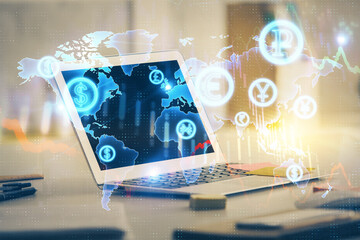 Forex market chart hologram and personal computer background. Multi exposure. Concept of investment.