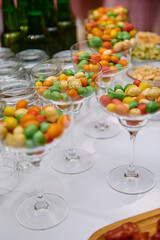 Buffet table with beer snacks at luxury wedding reception outdoors, copy space. Serving food and appetizers at restaurant. Catering banquet table