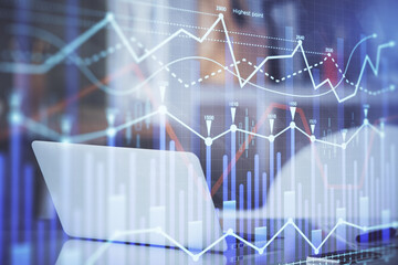 Forex Chart hologram on table with computer background. Double exposure. Concept of financial markets.