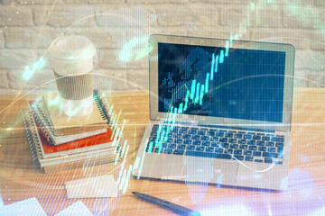 Double exposure of forex chart and work space with computer. Concept of international online trading.