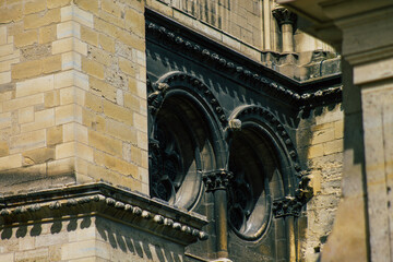 View of the exterior facade of the Roman Catholic Notre Dame de Reims Cathedral, a historical...
