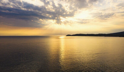 Beautiful sunset at the sea with dramatic sky