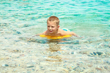 happy child playing at sea in park